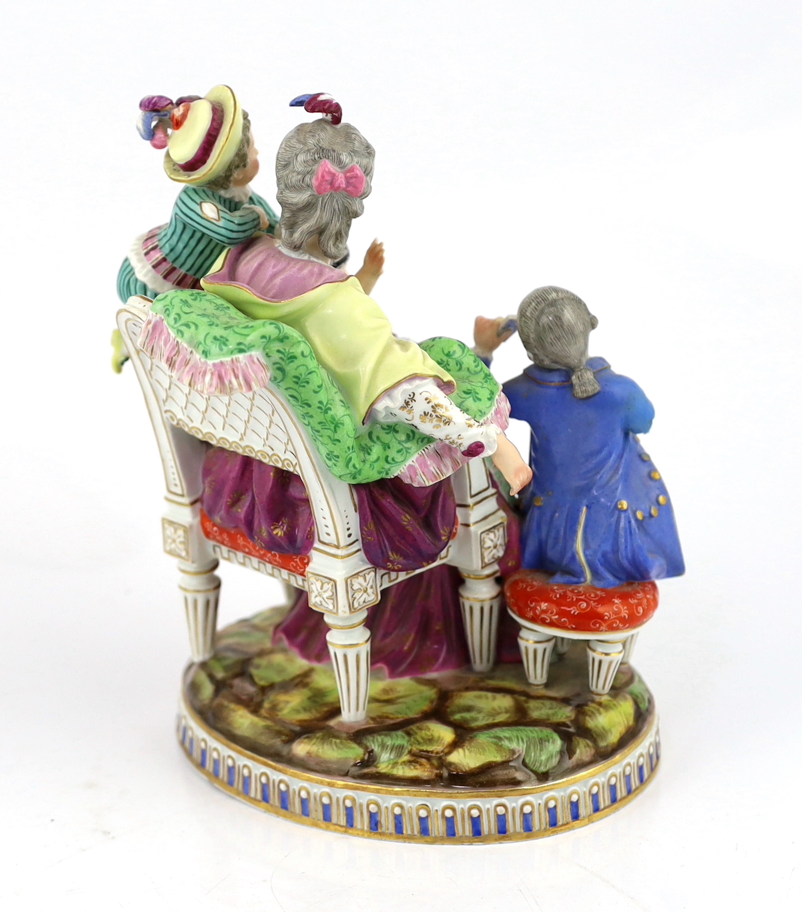 A Meissen group The Good Mother, 19th century, arm detached but present